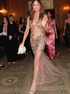 [x]Chrissy Teigen turns heads in sheer dress at ACE Awards after skipping ...